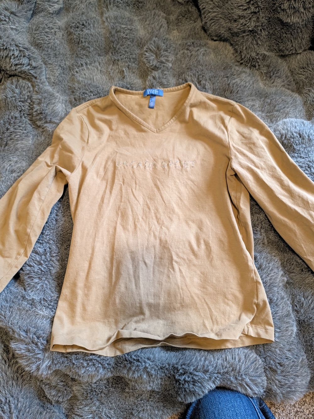 Escada Sport long-sleeve V-neck top featuring a sparkling rhinestone logo across